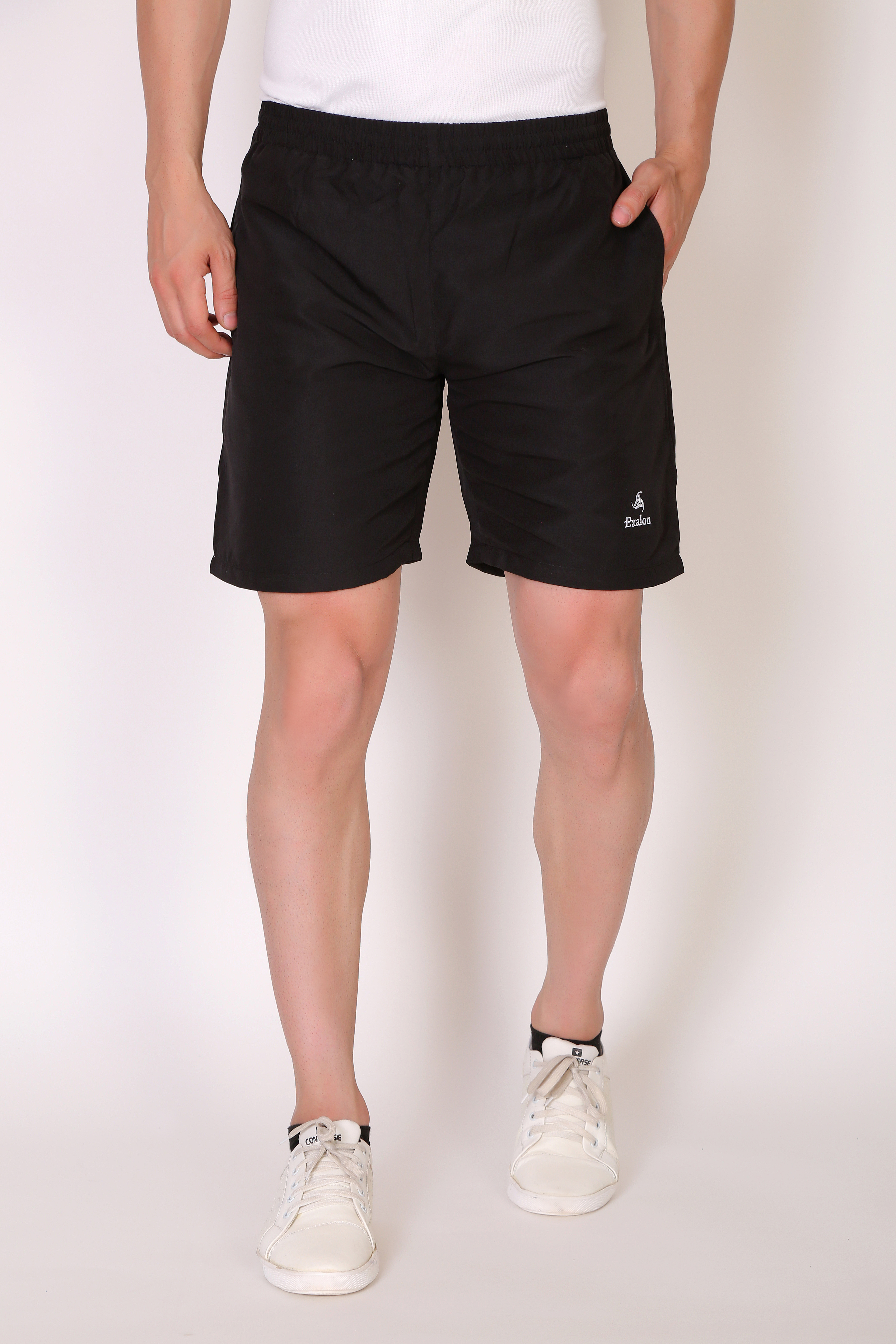 100% polyester fabric for durability and quick-drying comfort Regular fit with mid-rise design for a flattering and comfortable silhouette Above-knee length for a modern, sporty look Adjustable drawstring closure for a secure fit Zipper pockets to safely store valuables Available in Black, Navy, Blue, White, and Khaki Lightweight and breathable, ideal for workouts and casual wear Easy to mix and match with your favorite casual tops and activewear